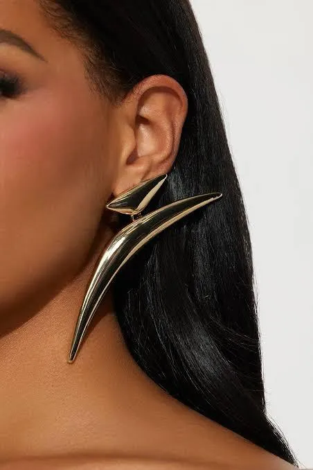 Gold spike oversized earrings